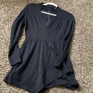 Black CR romper. Sexy front triangular cut.